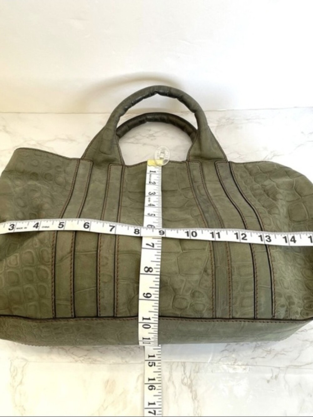 Desmo Animal Embossed Top Handle Bag.